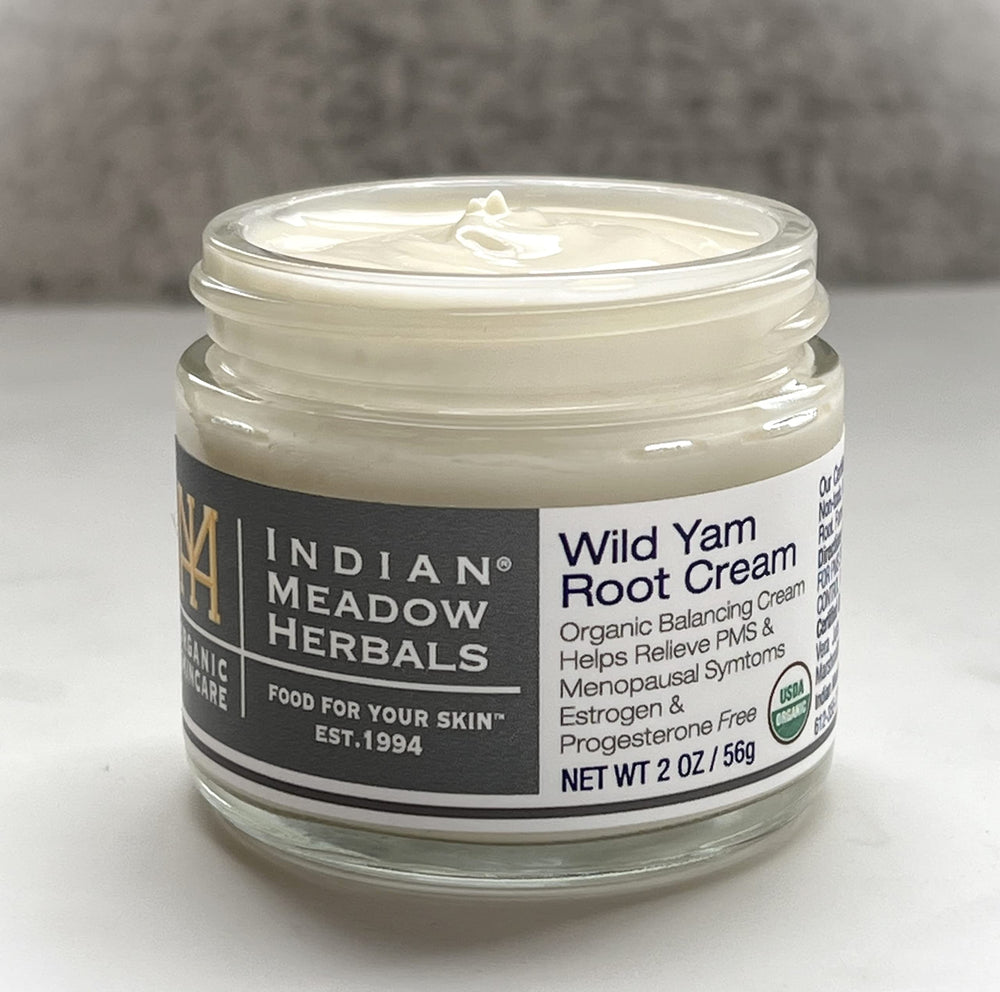 Indian Meadow Herbals herbal leaves backdrop highlighting natural origins and herbs.