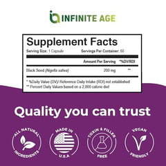 Infinite Age black seed oil capsules on a vanity for skin care.