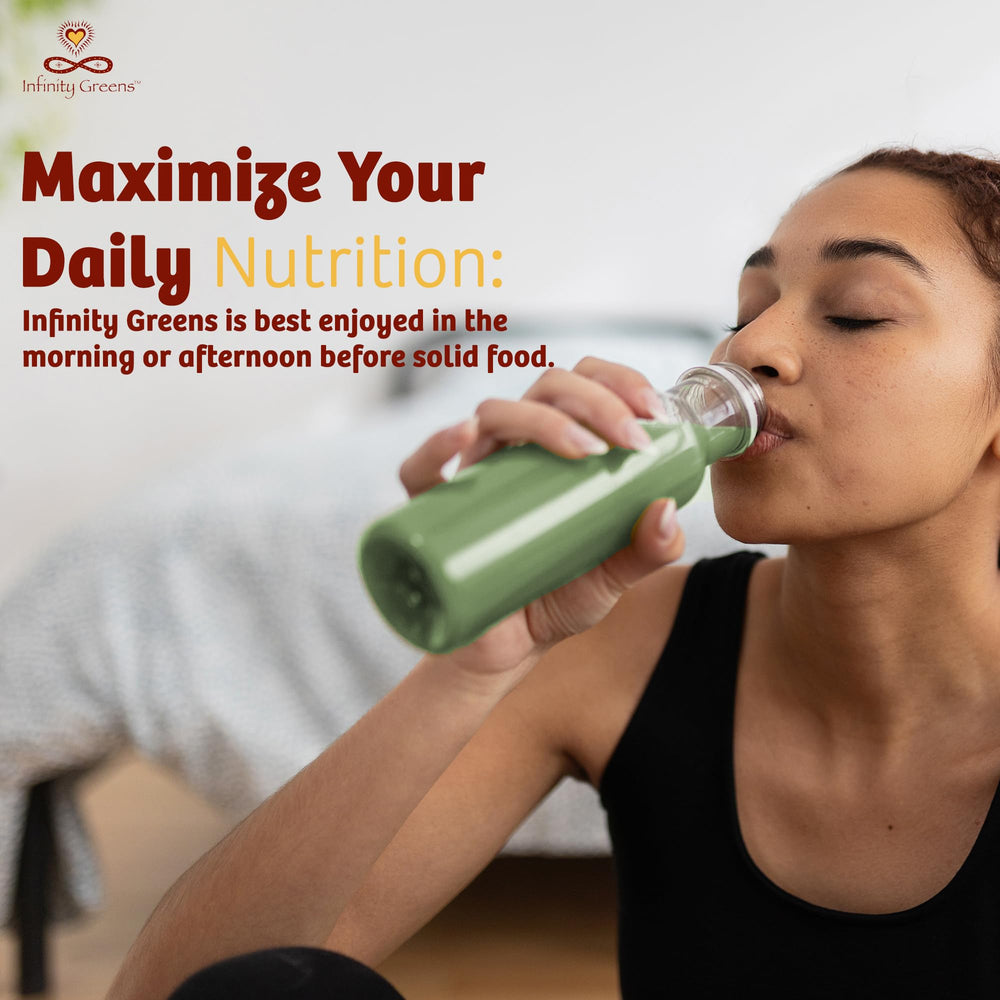 Infinity Greens daily-use capsules with glass of water for a simple routine.