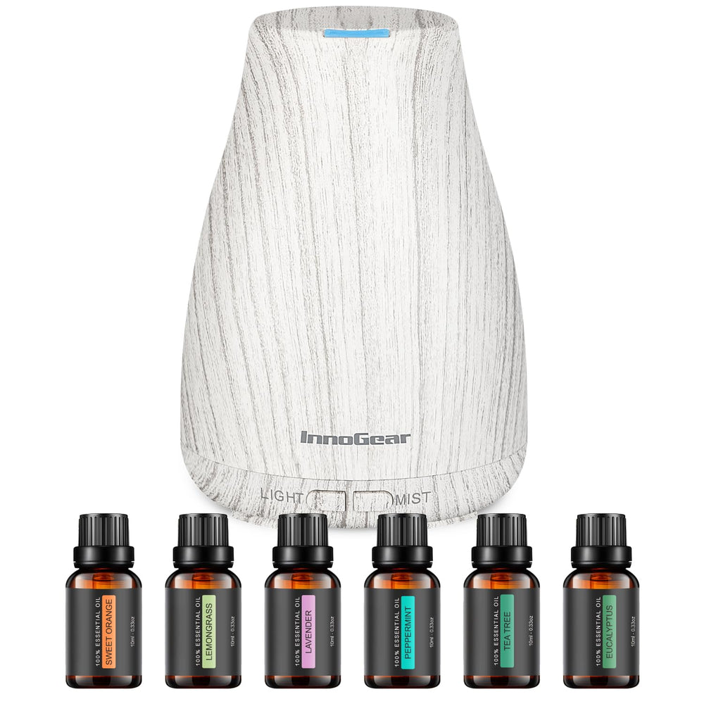 InnoGear diffuser with wood-grain base for calming ambient aroma.