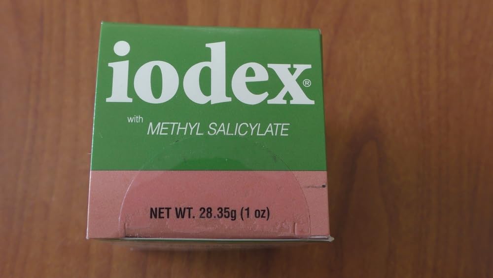 IODEX BAAR ointment being massaged into the skin.