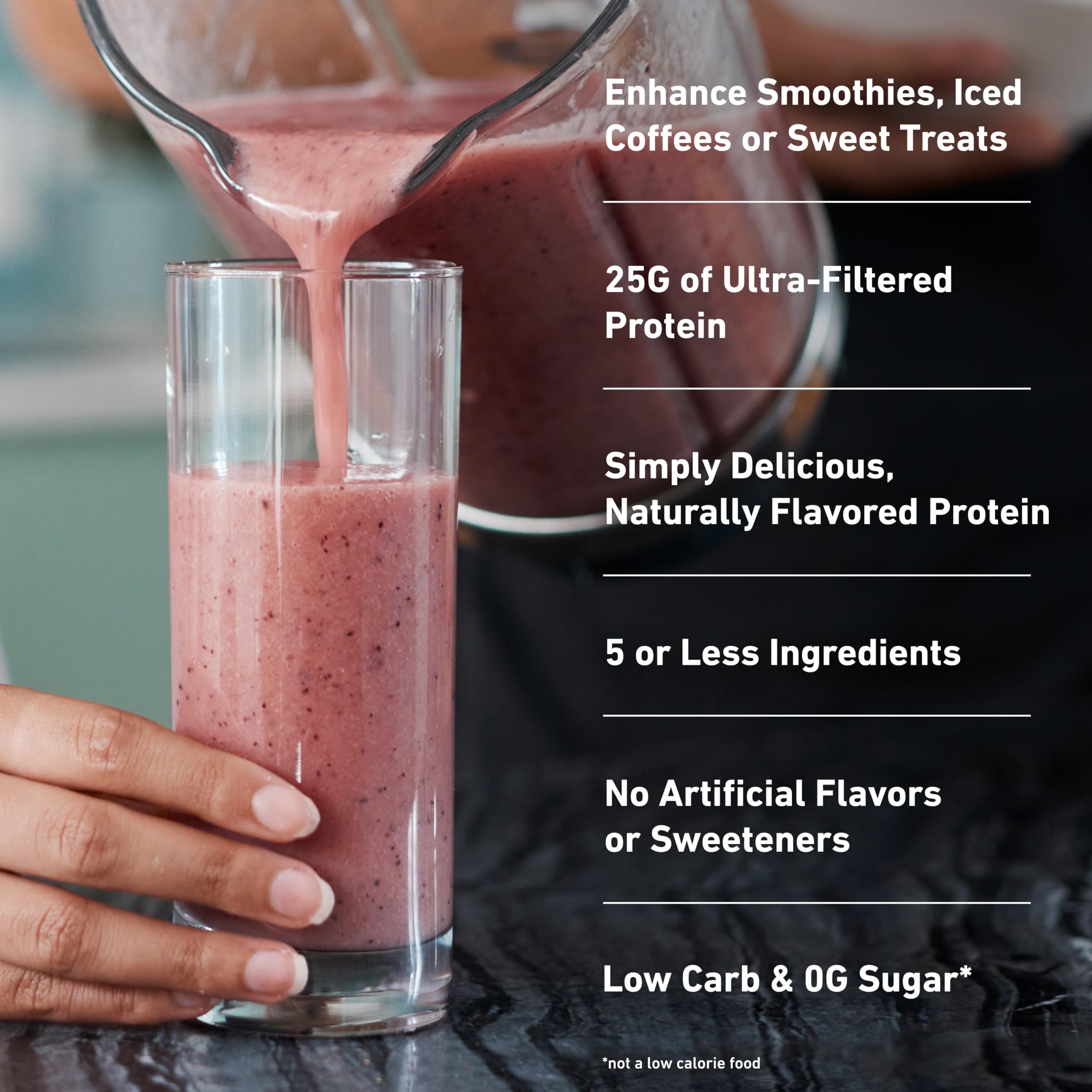 Isopure shake in glass with strawberry flavor ready to sip.