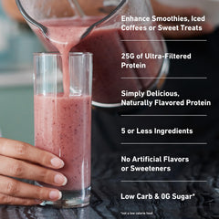 Isopure shake in glass with strawberry flavor ready to sip.