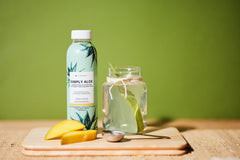 It Works! Simply Aloe Mango ingredients graphic showcases organic aloe and essential nutrients.
