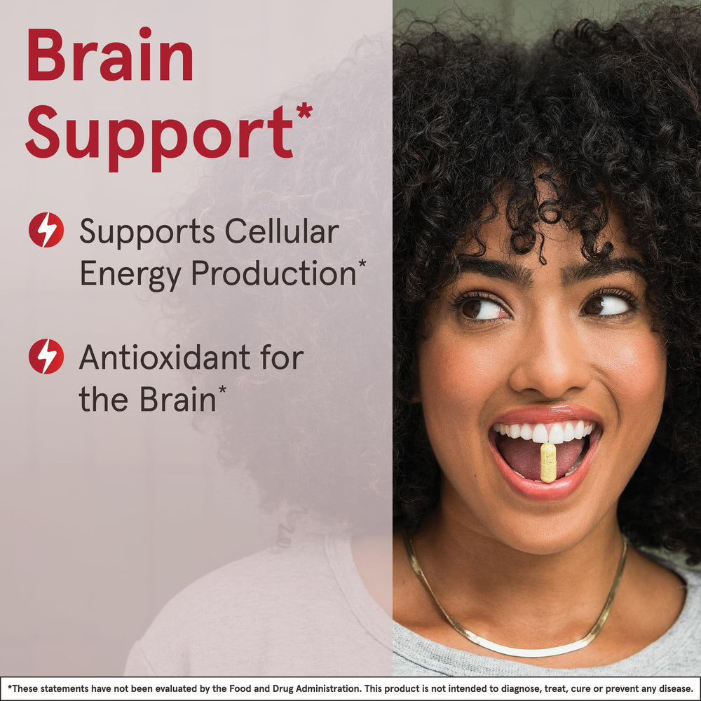Jarrow Formulas Acetyl L-Carnitine veggie capsules on table; vegan-friendly daily option.