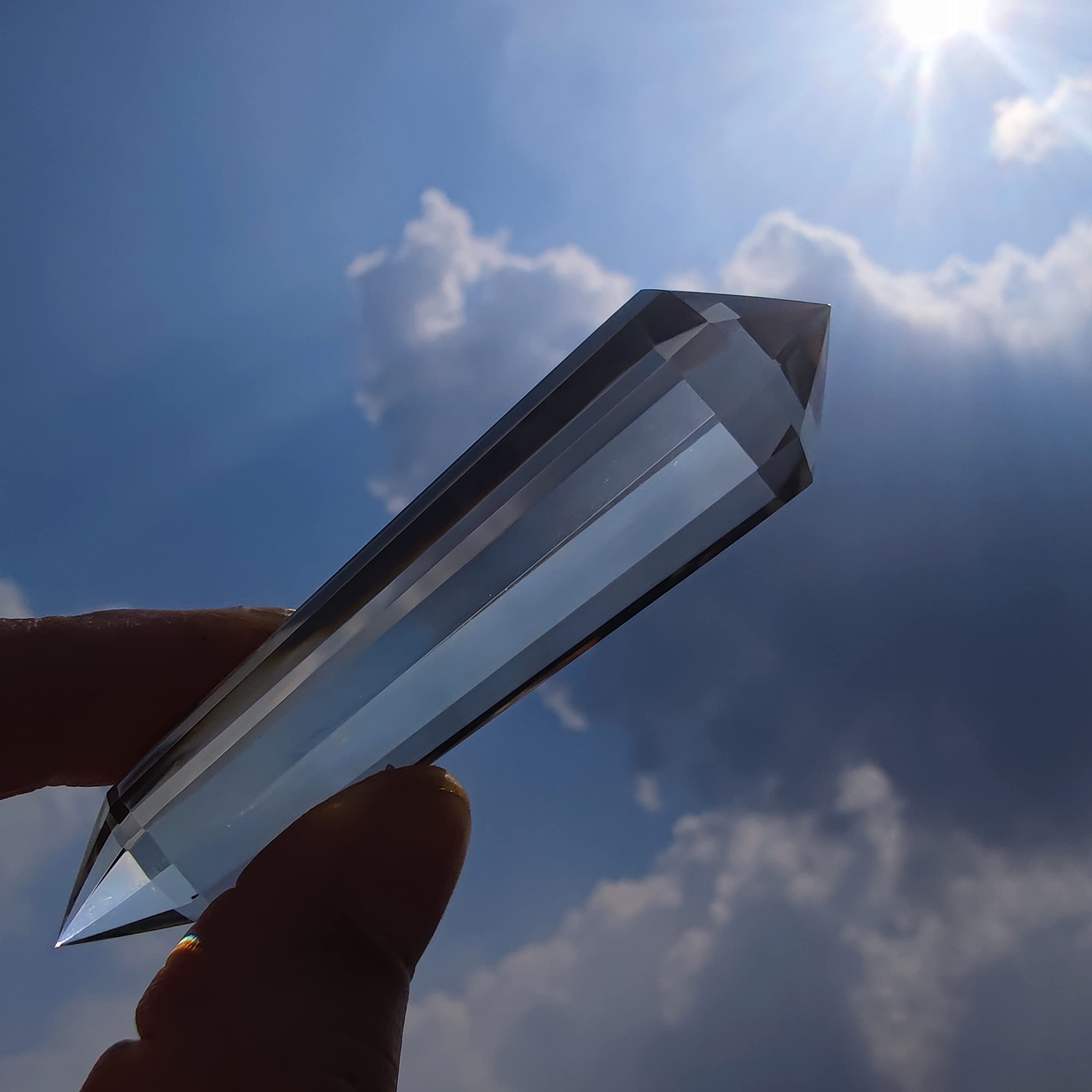 jdflying Double-terminated quartz wand, smoky variant, boosts energy transmission and amplification.