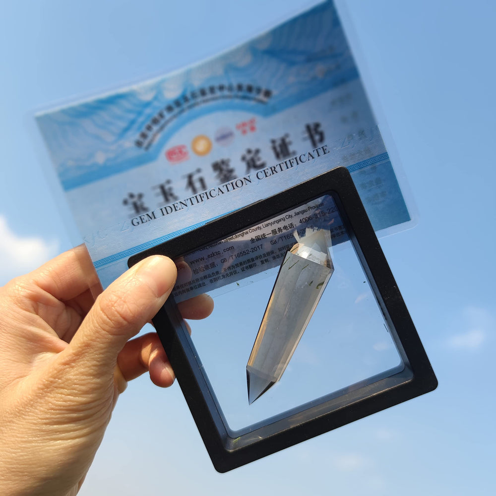 jdflying Natural quartz wand with visible inclusions, unique and characterful.