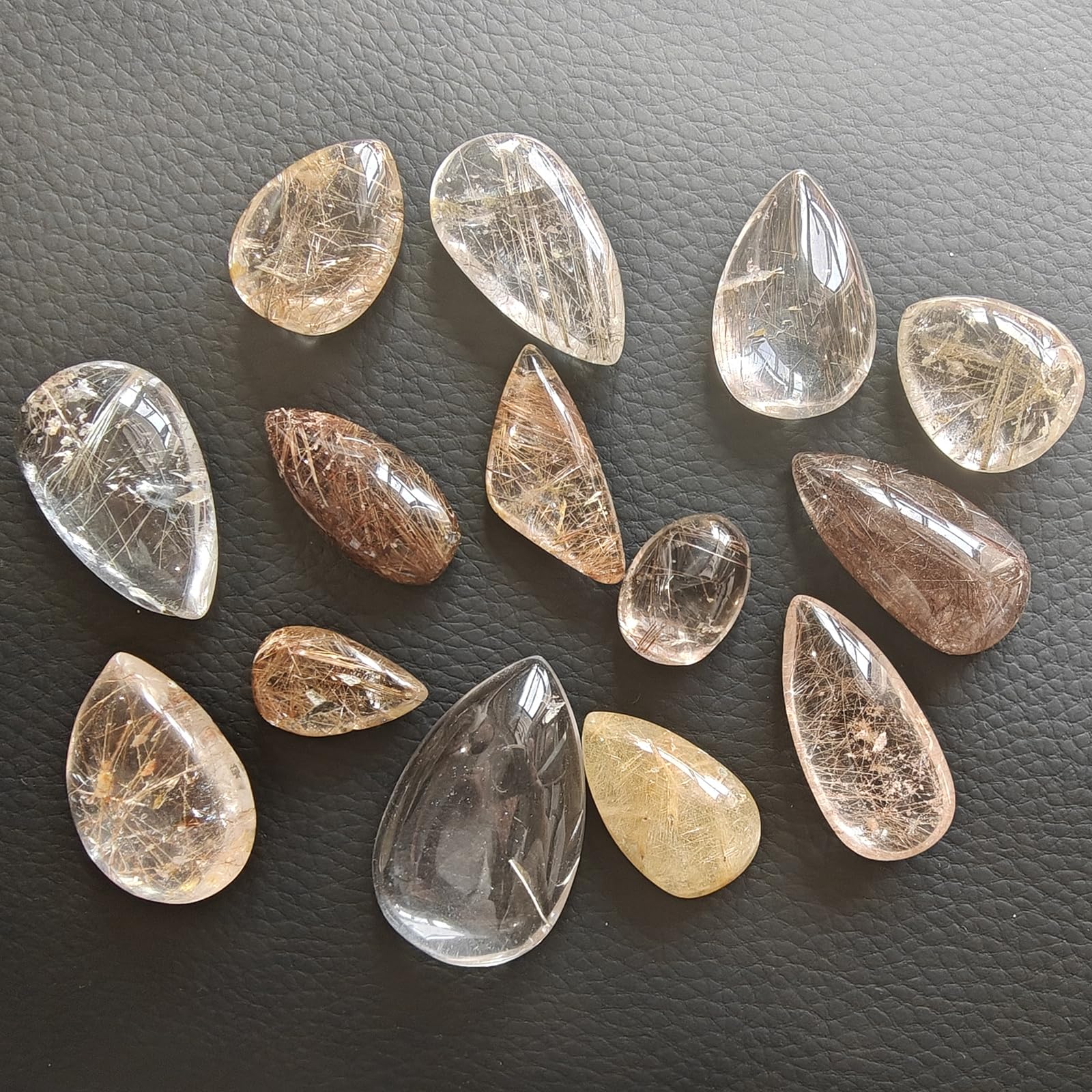 JDFlying rutilated quartz Venus hair stone showcasing natural needle patterns.