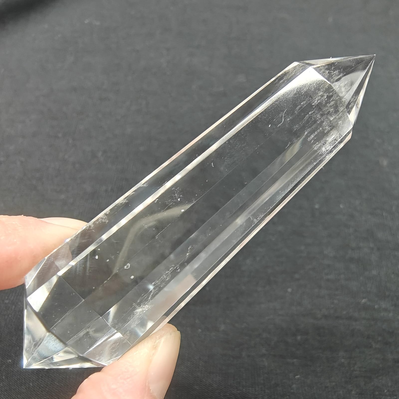 JDFlying Vogel crystal wand near workspace to support calm and clarity.