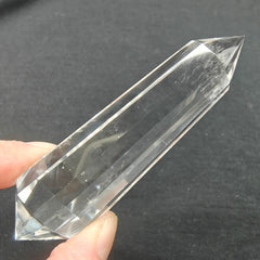 JDFlying Vogel crystal wand near workspace to support calm and clarity.