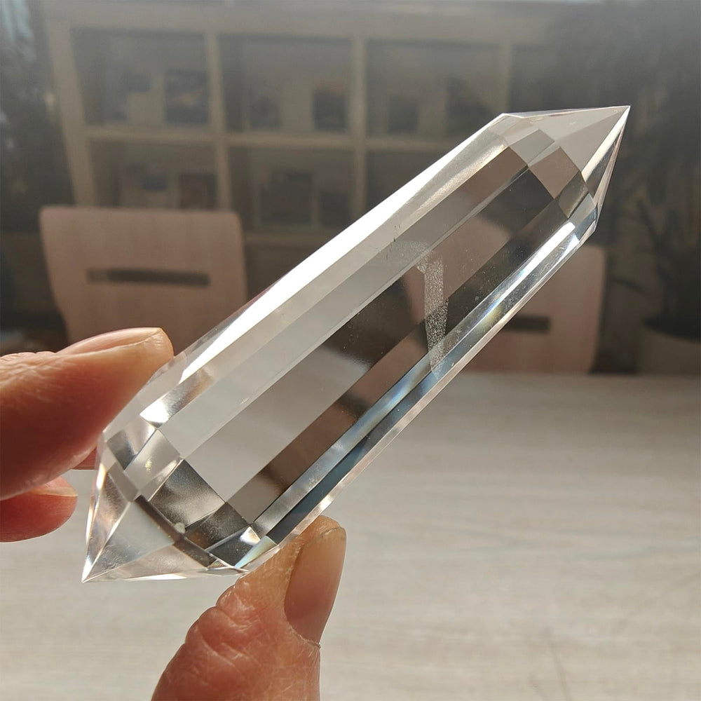 JDFlying Vogel crystal wand held during meditation to amplify focus.