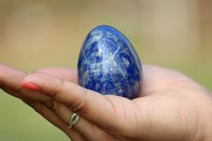 Jet International Lapis Lazuli egg as elegant home décor with a natural blue glow.