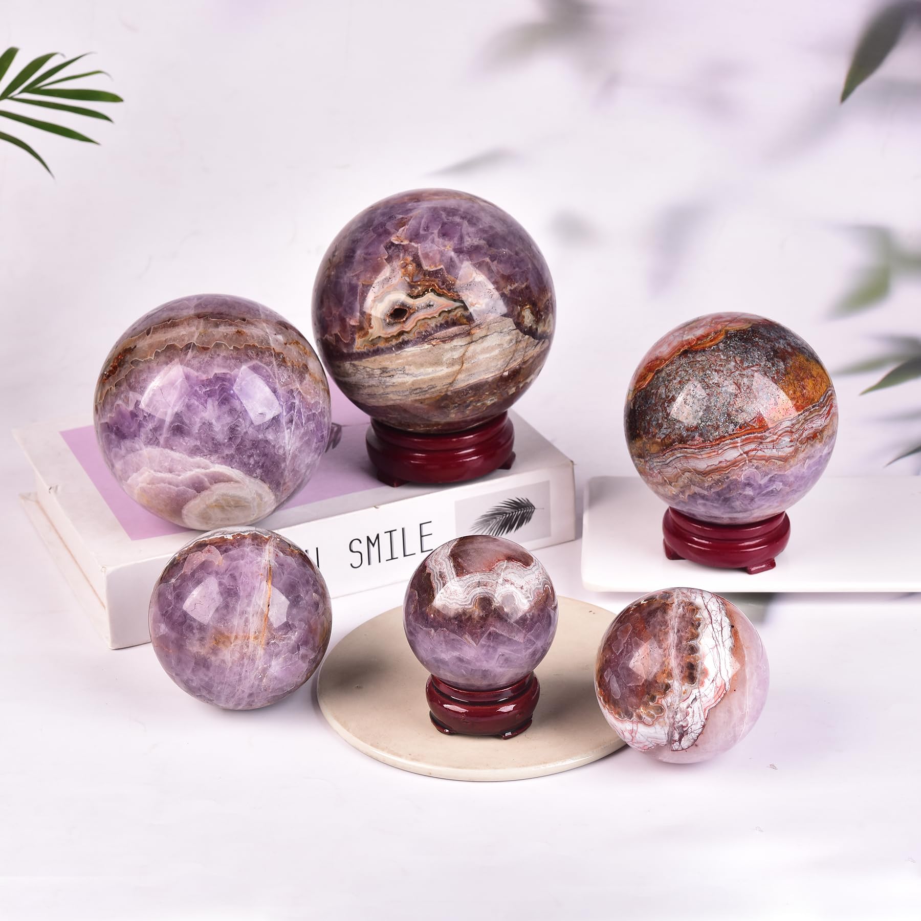 JIC Gem amethyst sphere color variations highlight natural beauty