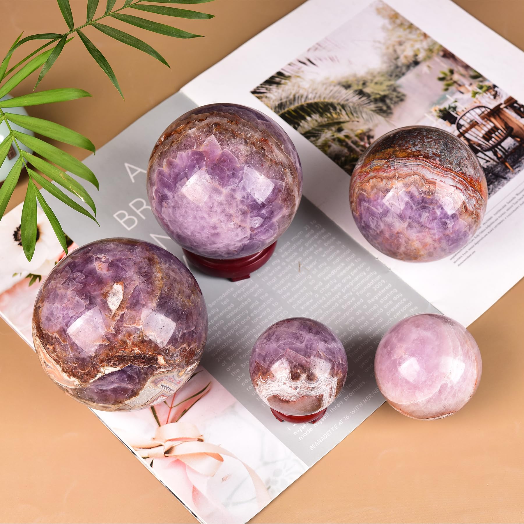 JIC Gem amethyst sphere on an office shelf for decor