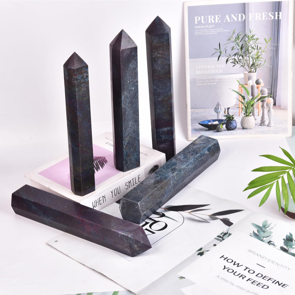 JIC Gem blue green ruby zoisite wand on desk, elegant decor with calm vibe.