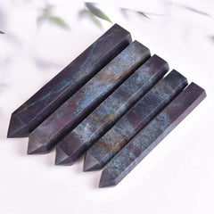 JIC Gem blue green ruby zoisite wand under light, fluorescence adds visual depth.