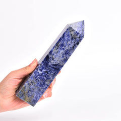 JIC Gem blue sodalite obelisk close-up showing natural color variations