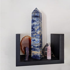 JIC Gem Blue Sodalite Tower in a calm room setup.
