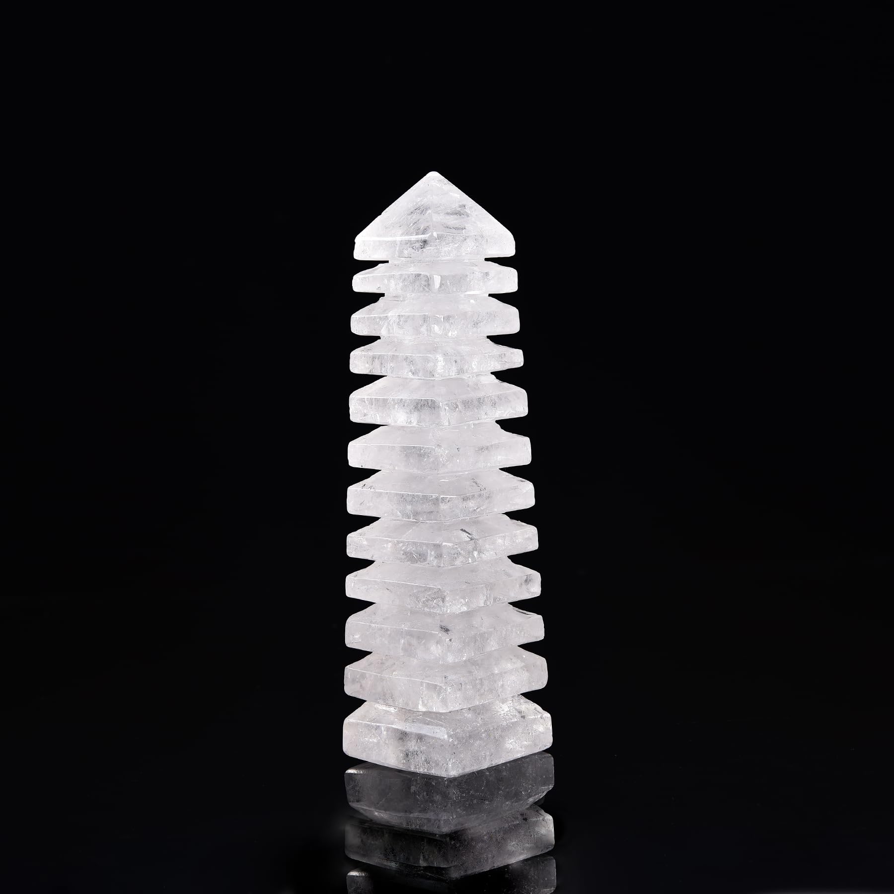 JIC Gem clear quartz tower top view, calm and centered energy.