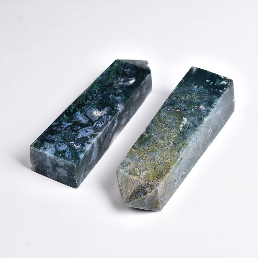 JIC Gem crystal-wand closeup highlights polished points and geodes.