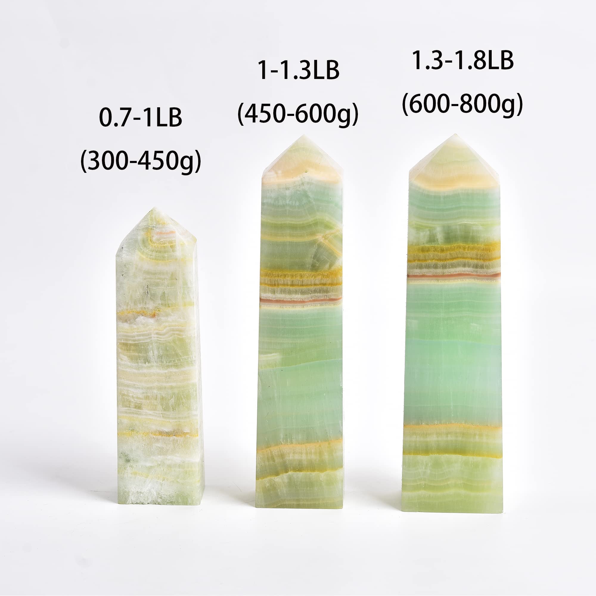 JIC Gem crystal wand polished point close-up for energy balance.