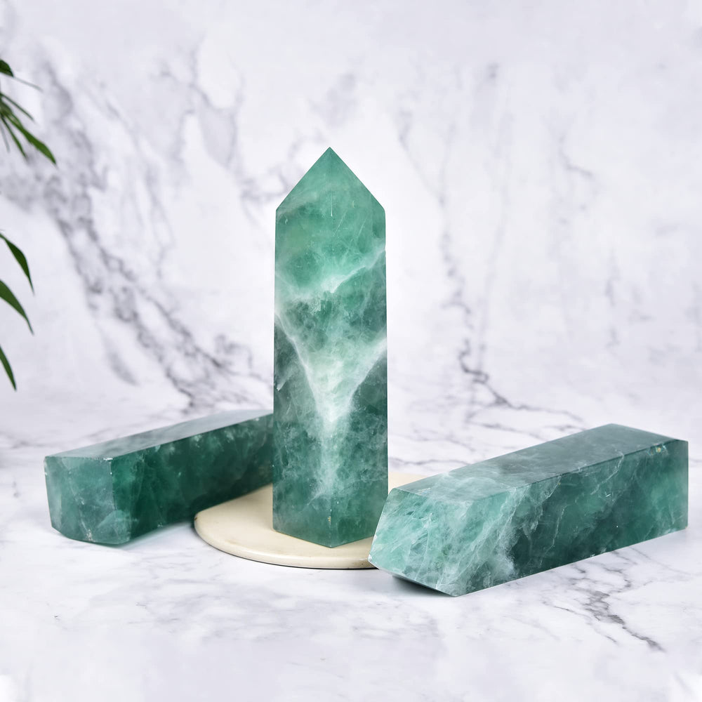 JIC Gem fluorite grid-friendly wand enhances energy flow in meditation.