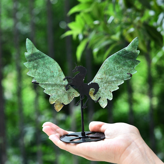 Close-up of JIC Gem carved unicorn wings showing natural fluorite detail