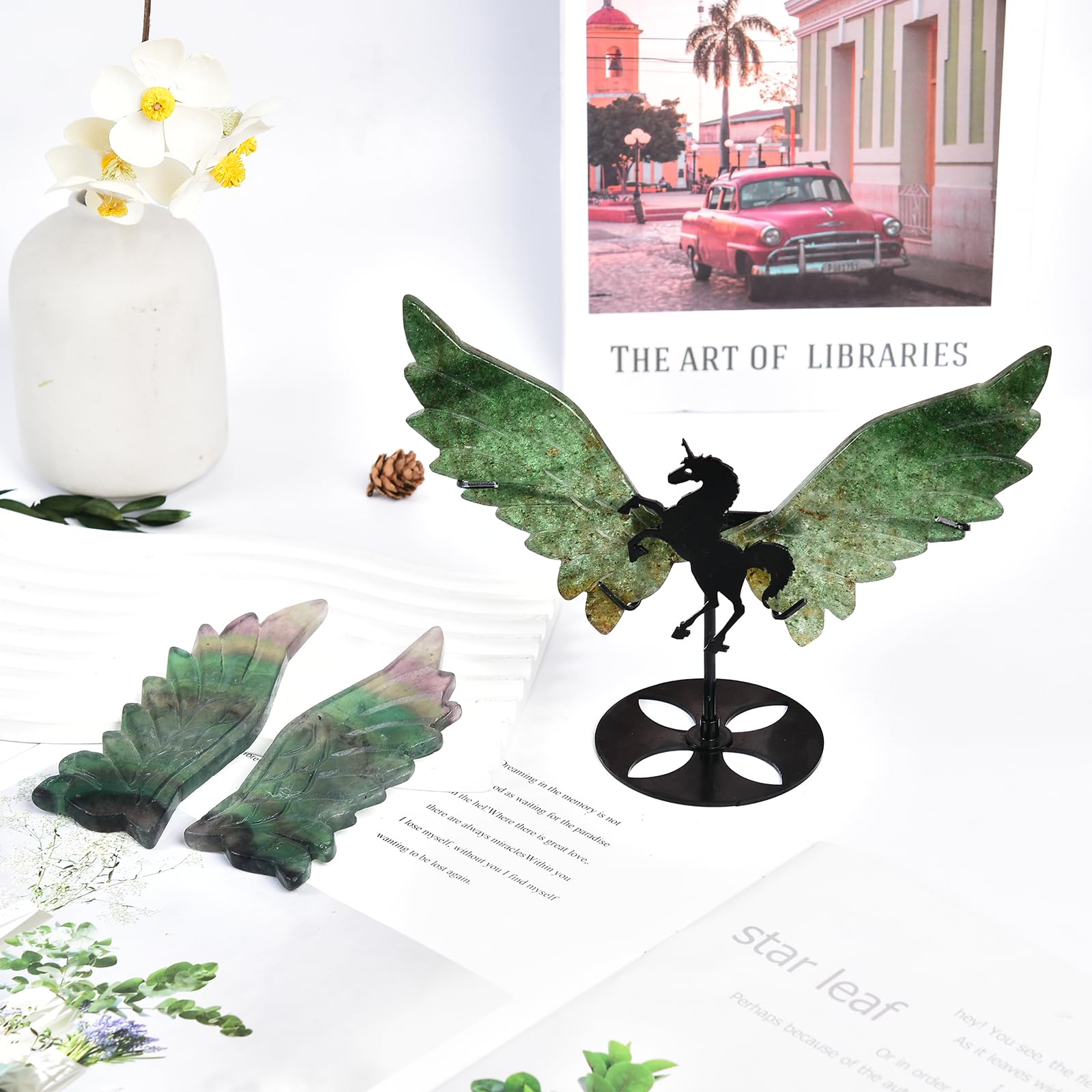 Wings on stand by JIC Gem offer secure, elegant desk or shelf display