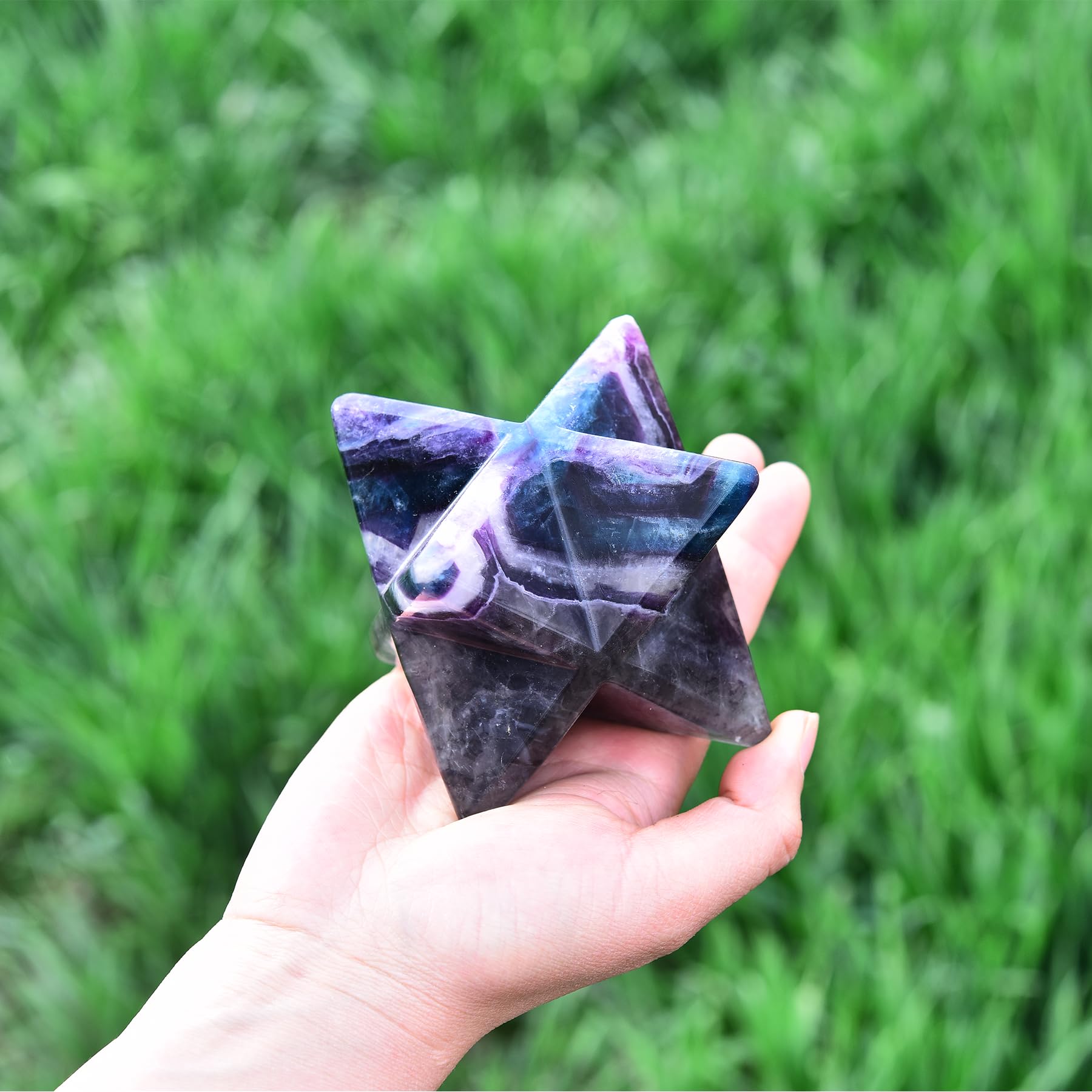 JIC Gem Handcrafted Merkaba crystal showcasing sacred geometry for tranquil spaces.
