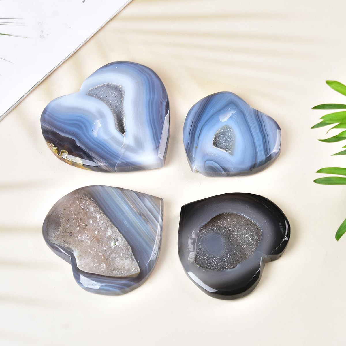 JIC Gem large agate heart palm stone held provides soothing tactile focus.