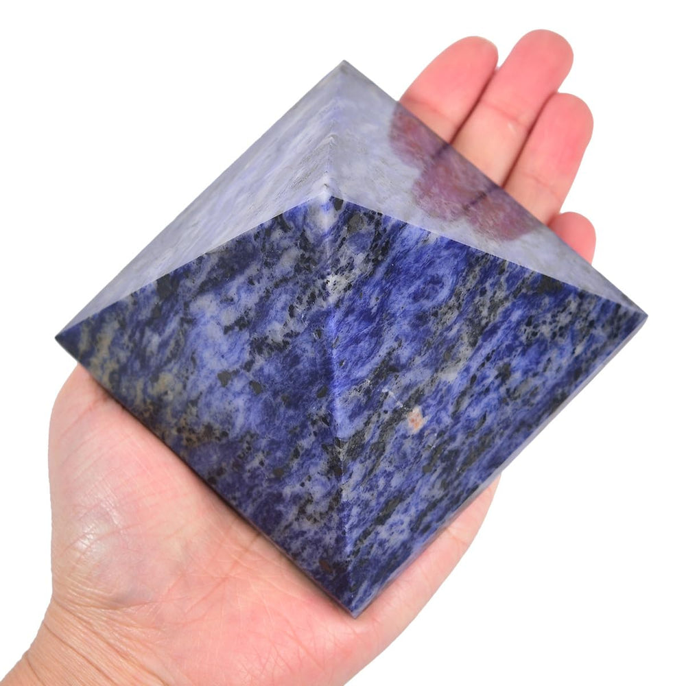 JIC Gem large sodalite pyramid on a desk for focused meditation.