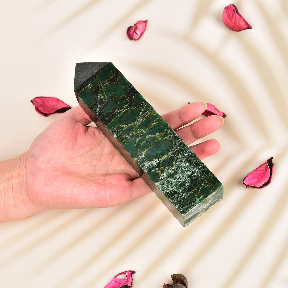 JIC Gem emerald quartz obelisk close-up point highlighting tetrahedral apex energy focus