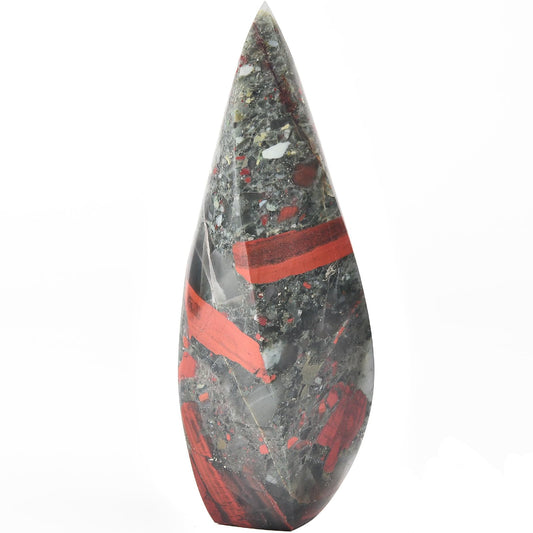 JIC Gem natural healing crystal point tower on a desk, highlighting focused energy.