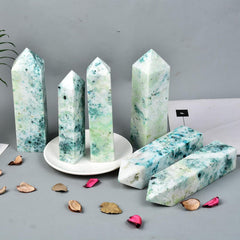 JIC Gem phoenix pine obelisk displayed on altar for healing ambiance.