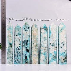 JIC Gem Phoenix Pine Quartz wand on display for grid and Reiki use.