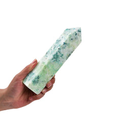 JIC Gem Phoenix Pine crystal wand in room decor and grid work.