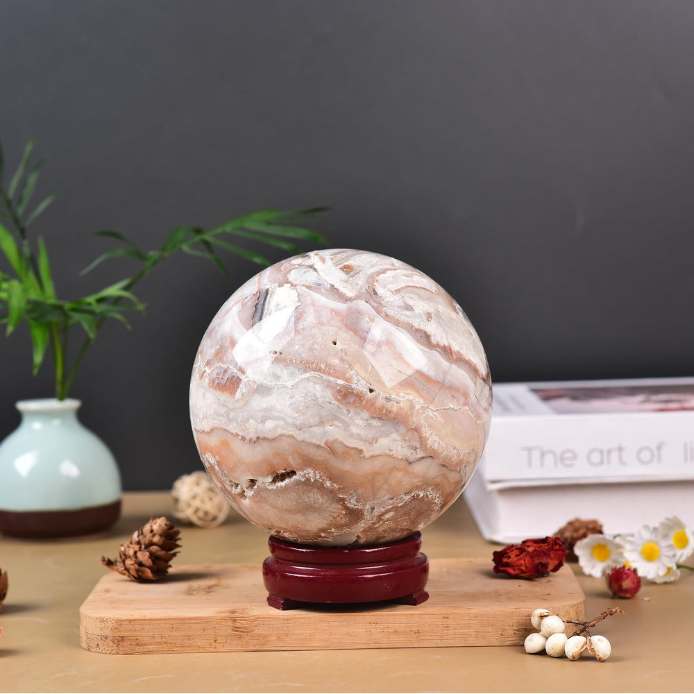 JIC Gem pink agate sphere supports focus during mindful sessions.