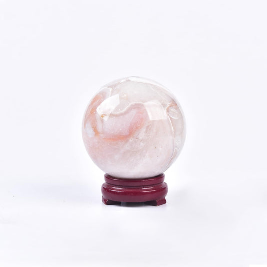 JIC Gem pink agate ball close-up reveals unique textures perfect for a focal point.