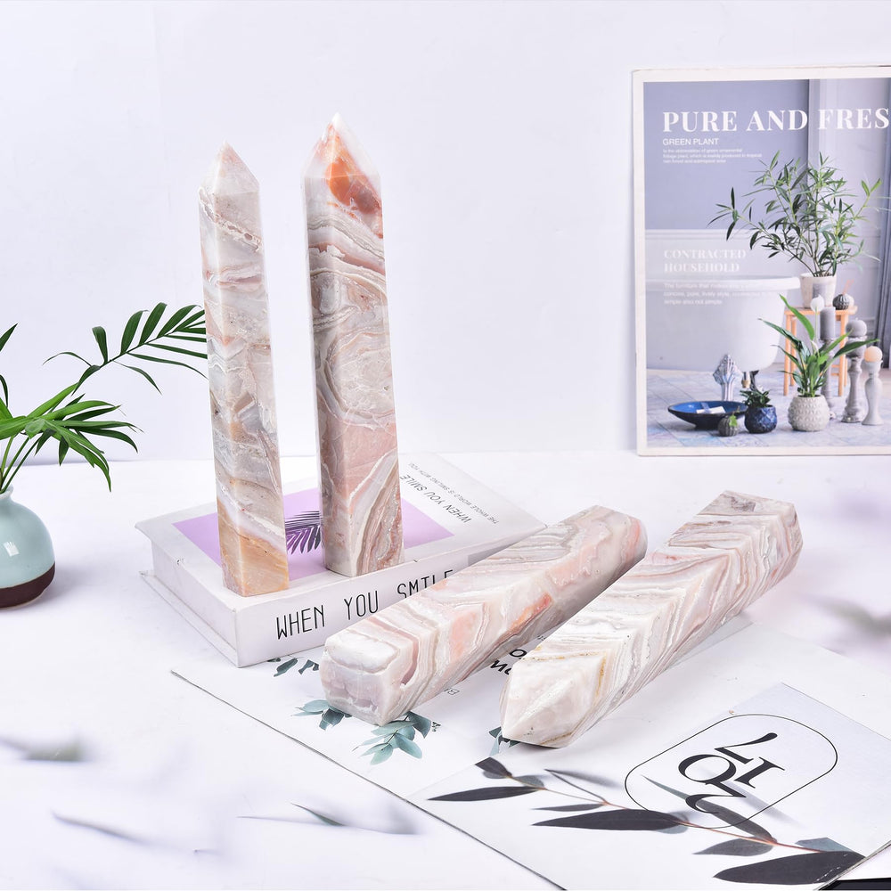 JIC Gem pink agate obelisk adds natural charm to any crystal display.