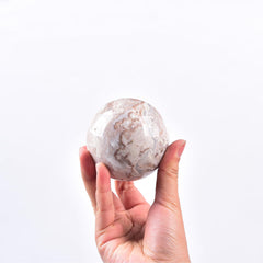 Close-up of natural pink agate patterns for a stylish feng shui accent.