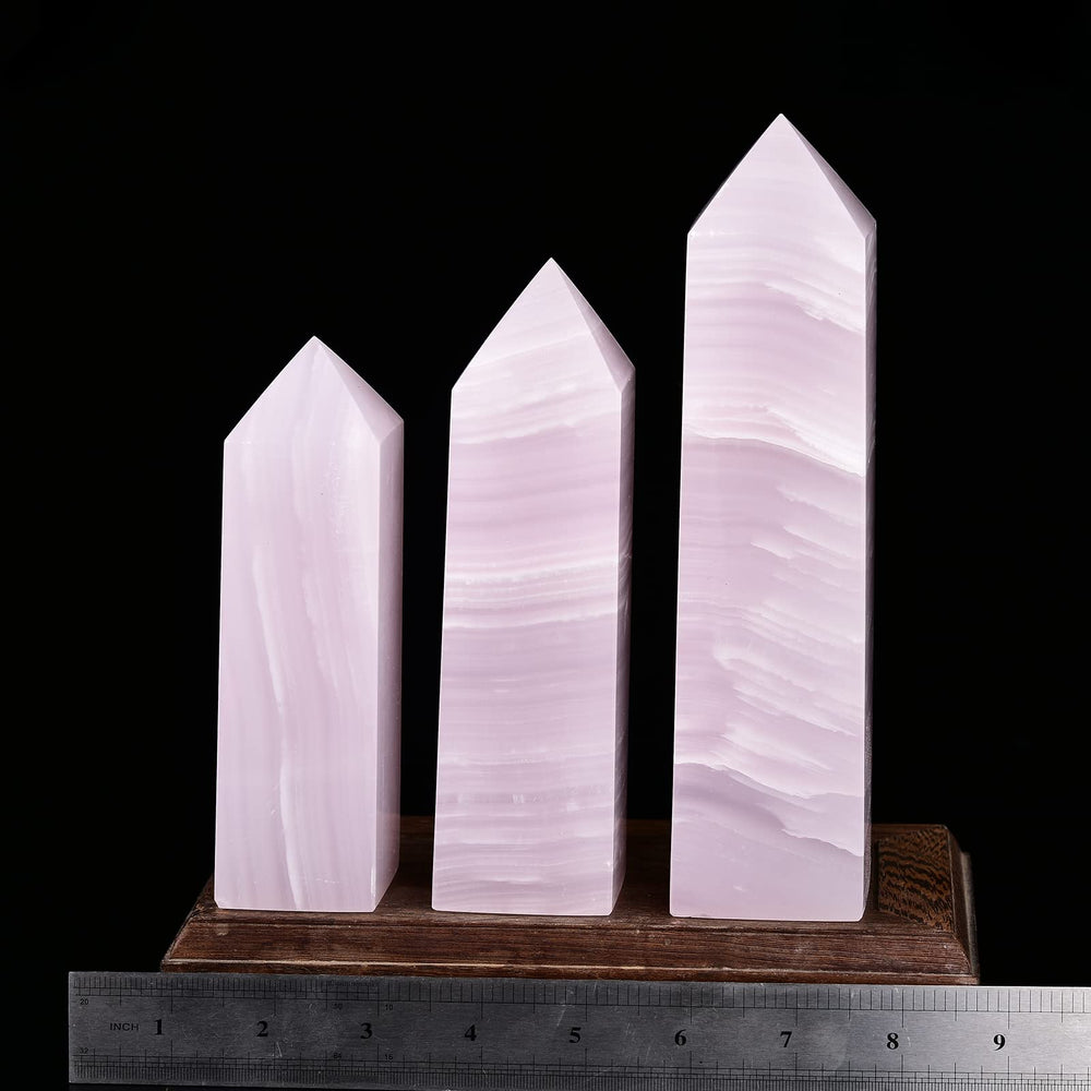 JIC Gem pink calcite obelisk on altar grid for meditation ambiance