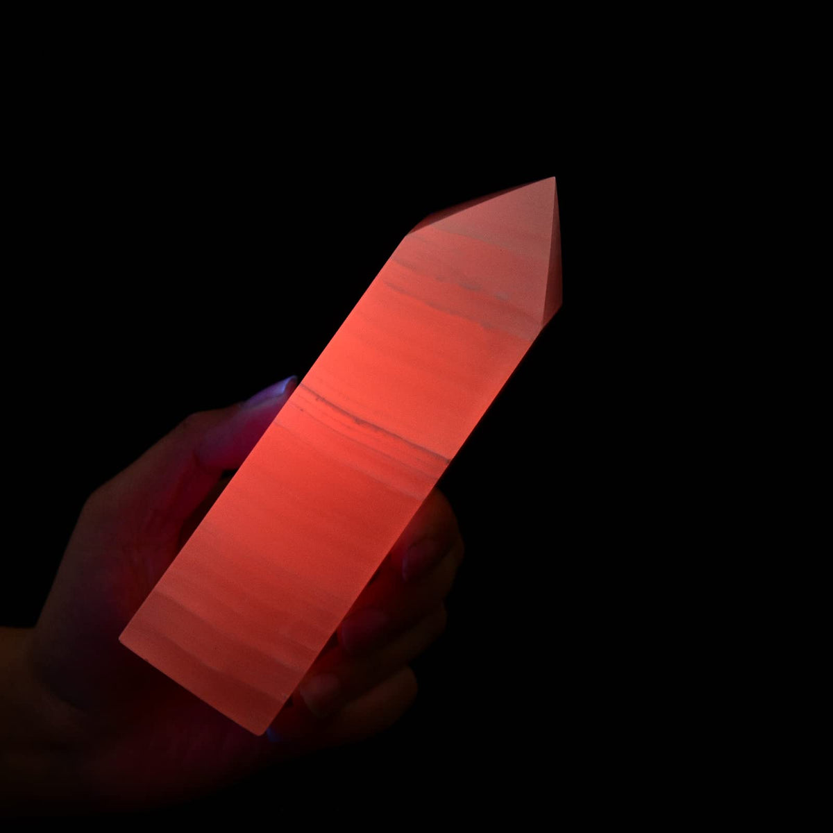 JIC Gem pink calcite obelisk wand front view with gentle energy focus