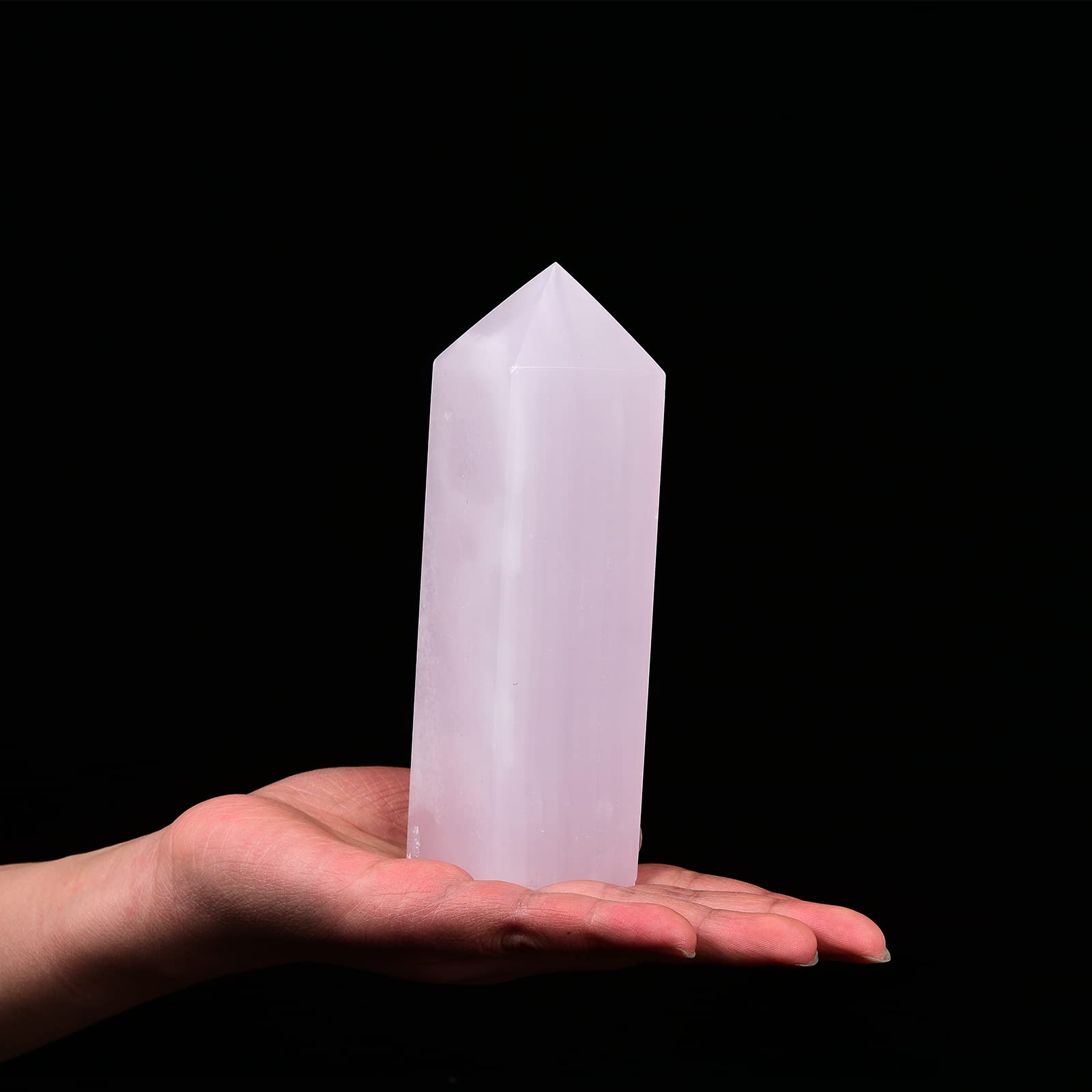 JIC Gem pink calcite tower close up showing natural facets for Reiki