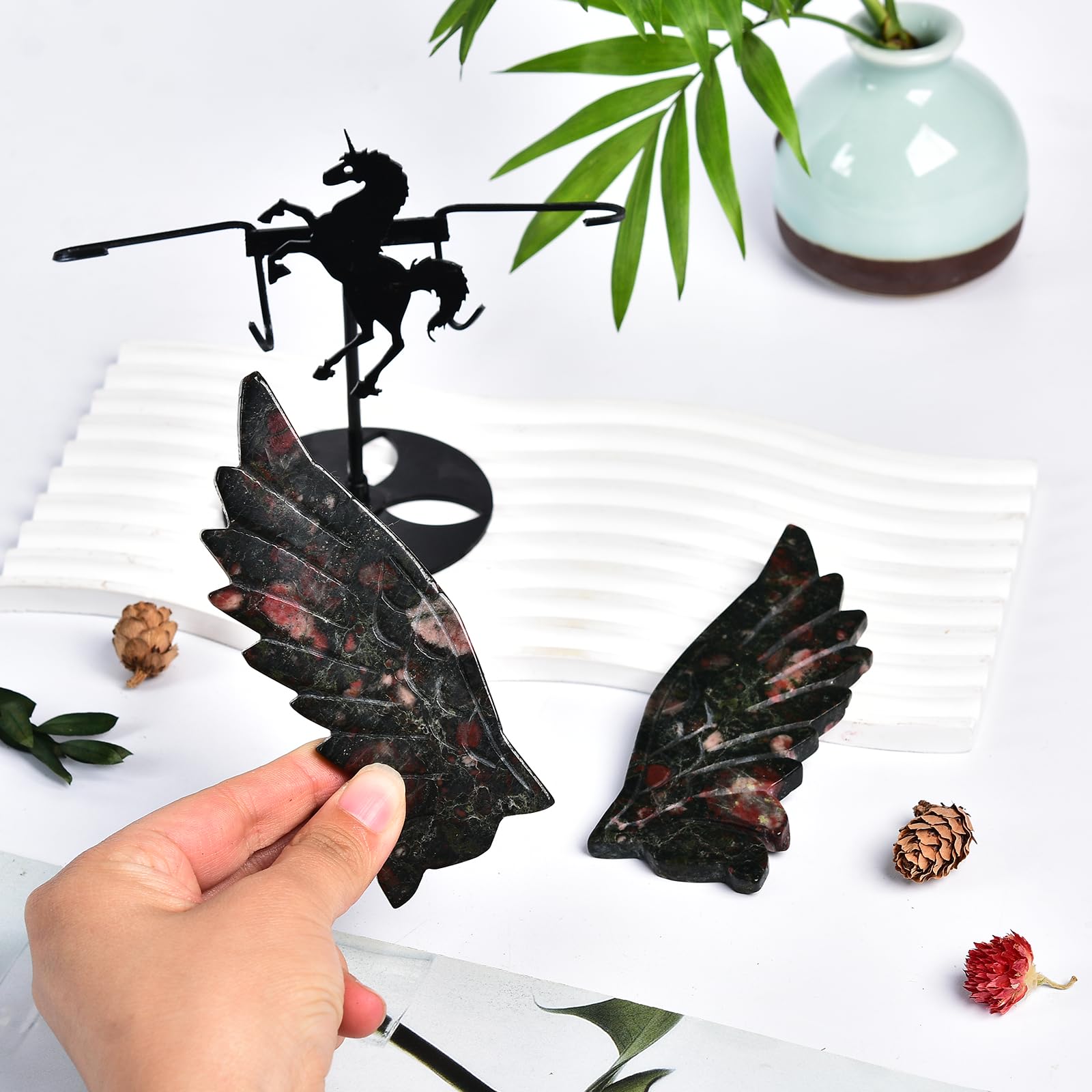 JIC Gem unicorn stand highlights the crystal wings as decorative centerpiece.