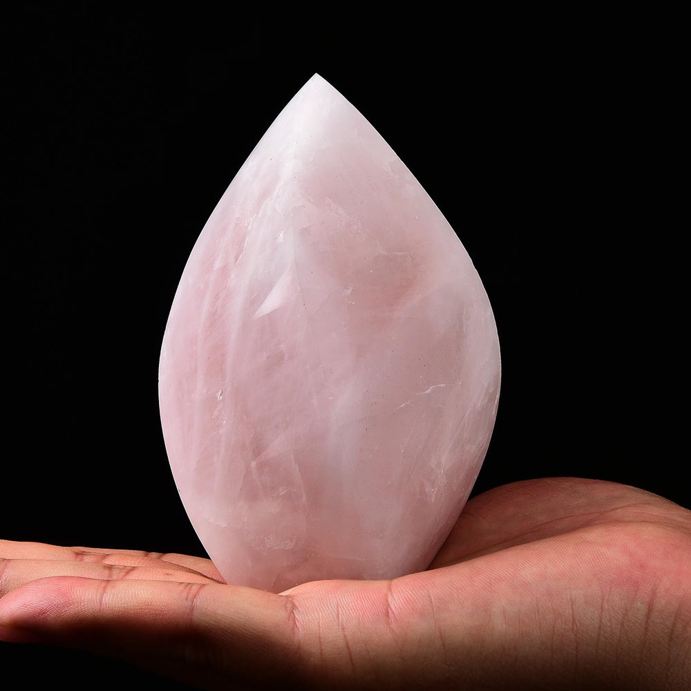 JIC Gem rose quartz four-faced spiral wand channels energy for balance.
