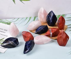 JIC Gem rose quartz tower supports meditation and tranquil retreats.