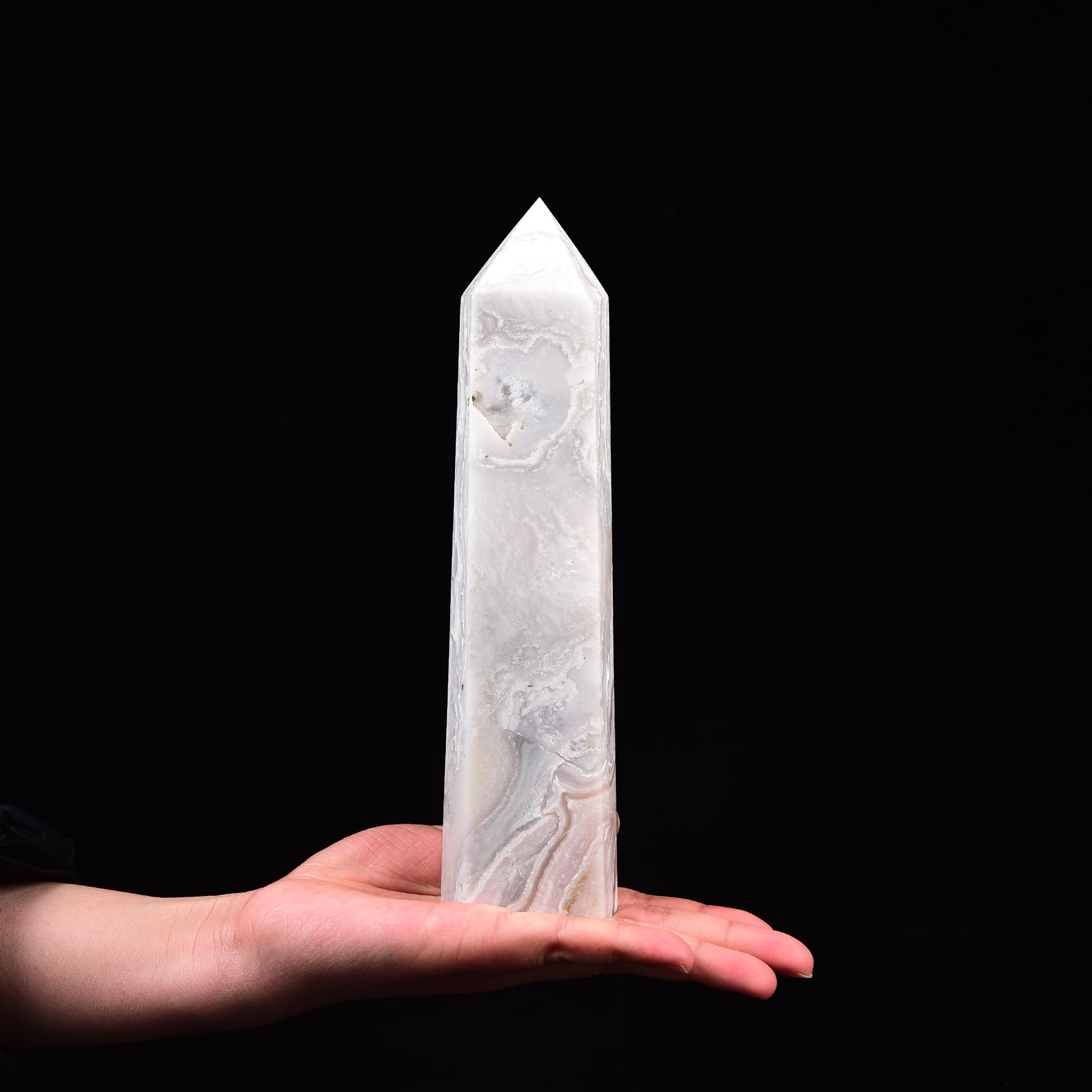 JIC Gem six-faceted pink wand highlights energy focus for Reiki sessions.