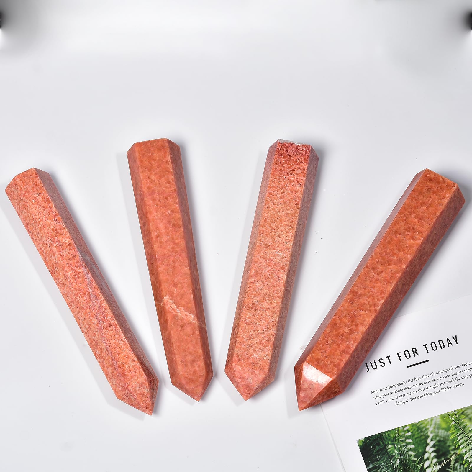 JIC Gem sunstone obelisk on desk supports mindfulness and focus