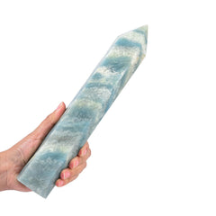 JIC Gem trolleite obelisk wand perched on a shelf for meditation