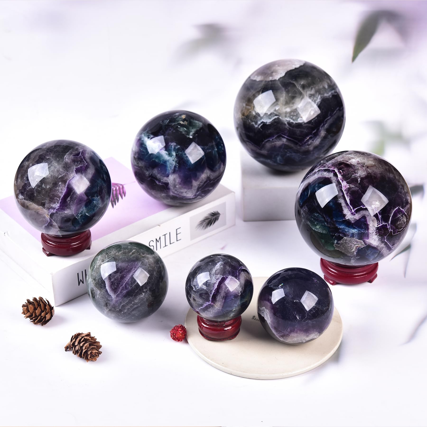 Collectible fluorite crystal ball, the perfect gift for energy enthusiasts.